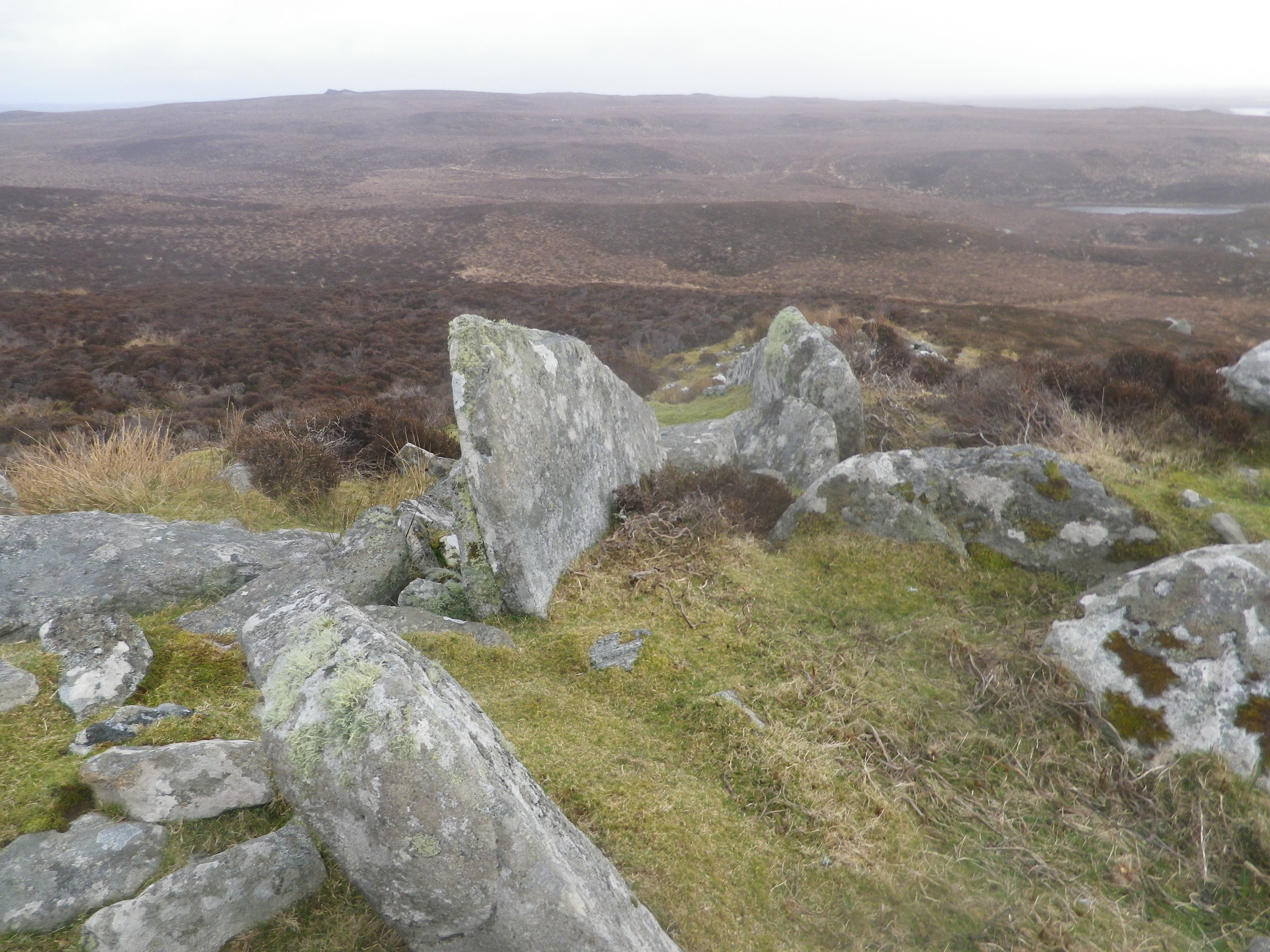 Outlined against the skyline when viewed from the neighbouring chambered cairn to the south and west.